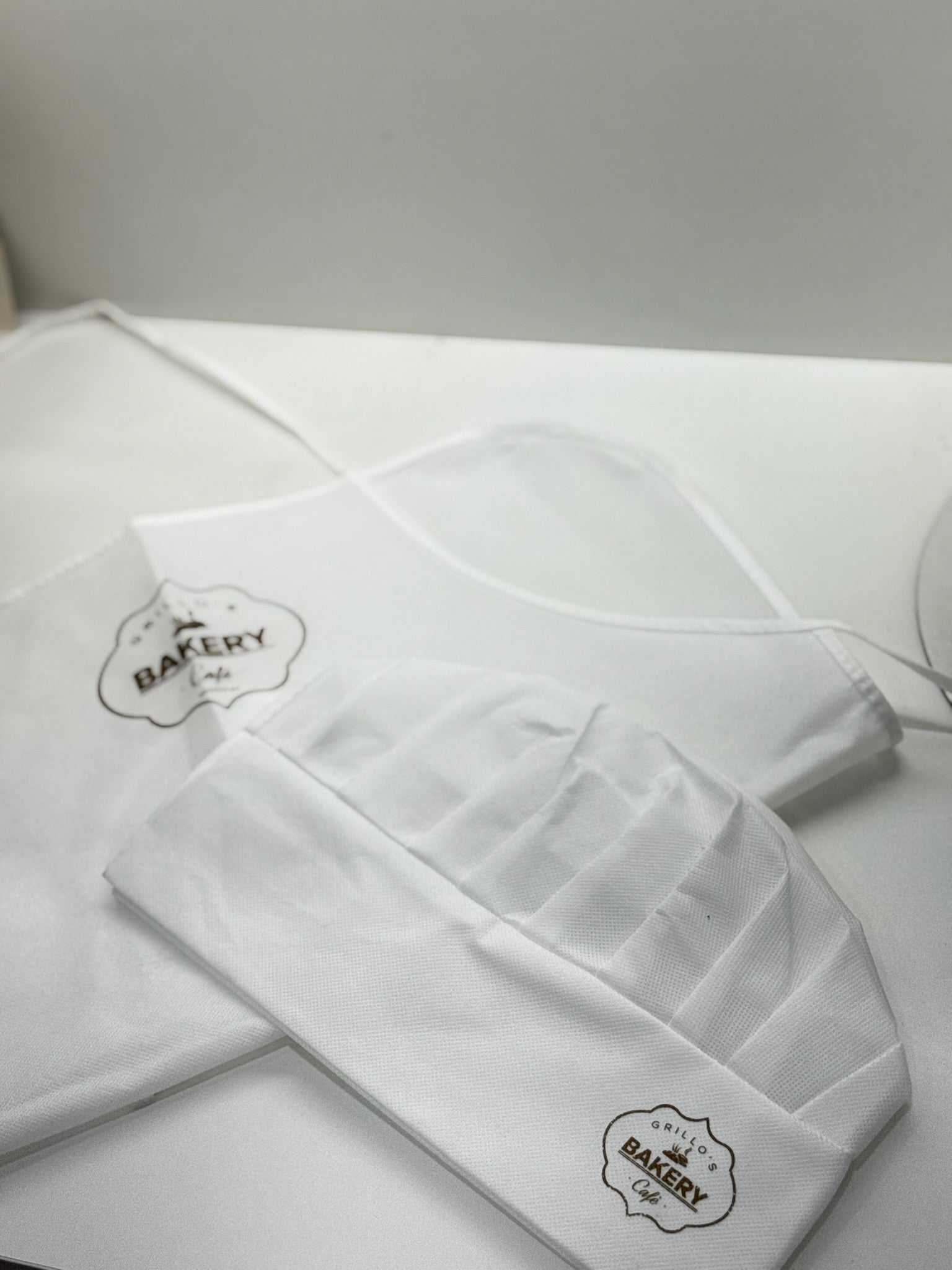 Grembiule e cappellino bimbo